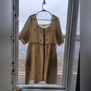 Chic Cream Dress with Bird Pattern